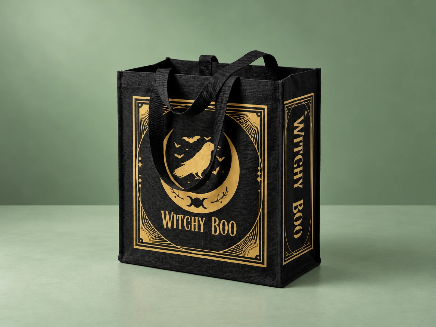 Black Witchy Woo laminated shopping bag with gold printing and long black handles