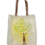 Cream laminated recycled RPET shopping bag with brown handles and a yellow tree design