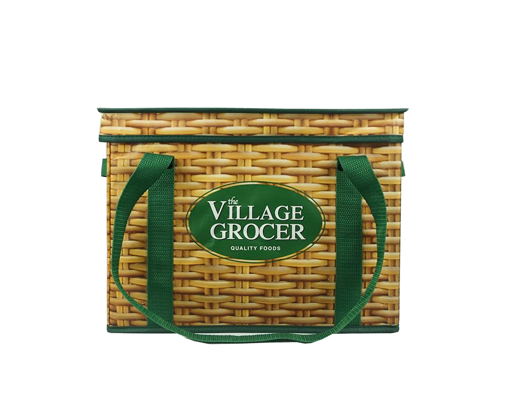 Village Grocer reusable grocery box with green handles and a printed wicker pattern